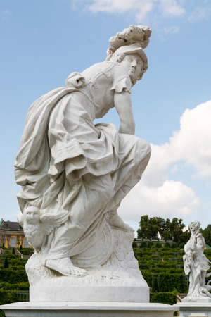 A marble statue, from around 1750, located at Sanssouci summer palace of Frederick the Great, King of Prussia, in Potsdam, near Berlin.のeditorial素材