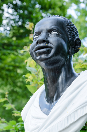 Baroque statue of an Afro-American woman (18 century), Potsdam, Brandenburg, Germanyの写真素材