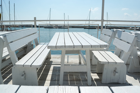 White restaurant tables and chairs, Black sea coast, Balchik, Bulgariaのeditorial素材