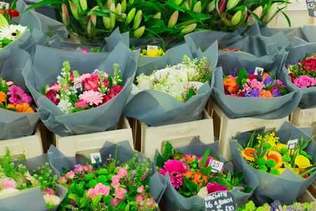 Street sale of flower bouquets near metro station.Roses,tulips, carnations,lilies,gypsophila,hyacinths,chrysanthemums. Selling for Valentine's Day on February 14, International Women's Day on March 8.の写真素材