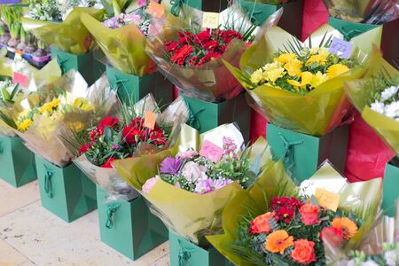 Street sale of flower bouquets near metro station.Roses,tulips, carnations,lilies,gypsophila,hyacinths,chrysanthemums. Selling for Valentine's Day on February 14, International Women's Day on March 8.の写真素材