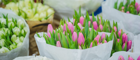 Wholesale floristic base, shop with flowers for Valentine's Day on February 14, International Women's Day on March 8. Natural fresh multi-colored tulips, roses red,pink,yellow,orange.Holiday shopping.の写真素材