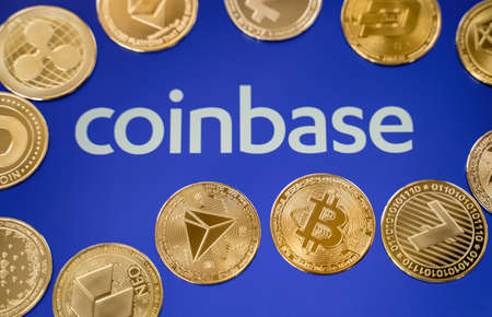 Russia Moscow 29.03.2021 Tablet with logo of cryptocurrency exchange Coinbase. Crypto coins company, service for buying, selling, trading, investing by market price. IPO start.Bitcoin,Ethereum,Ripple.のeditorial素材