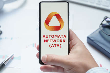 Russia, Moscow 08.06.2021. Logo of automata Network, ATA token in mobile phone. Decentralized protocol that provides middleware-like traceless privacy services for applications on multiple platforms.のeditorial素材