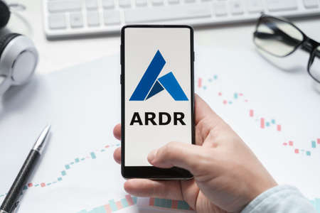 Russia Moscow 08.06.2021 Logo of Ardor in mobile phone. ARDR token.Multichain blockchain consensus-as-a-service platform.Cryptocurrency trading blockchain decentralized exchange DEX.Digital money.のeditorial素材