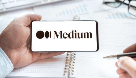 Medium website, page in tablet. Open free blog platform for blogger, reader for writing article, posts on any topic. Social net media resource for blogging. Business, news, information.のeditorial素材