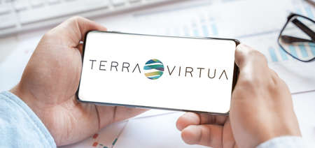 Logo of Terra Virtua Kolect coin in tablet. Cryptocurrency TVK token. Trading blockchain platform to buy,sell on decentralized exchange DEX,DEFI. Digital money.Business,investing.のeditorial素材