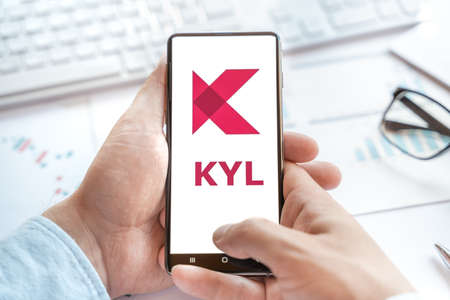 Logo of Kylin in tablet. Cryptocurrency coin KYL token. Trading blockchain platform to buy,sell on decentralized exchange DEX,DEFI. Digital money.Business,investing.のeditorial素材