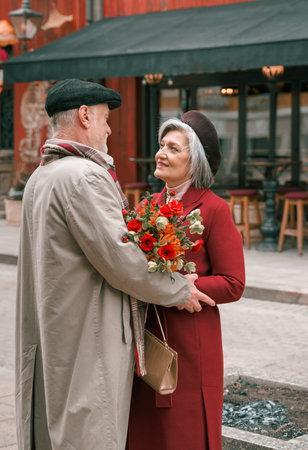 Elderly senior love couple. Old retired man woman together on romantic date.Aged husband wife...