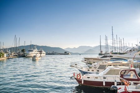 Turkey, Marmaris 24.12.2022 Motor and sail boats, yachts, launch in the water marina, dock, channel in the sunny sea port of the picturesque old city of Marmaris in Turkey.のeditorial素材
