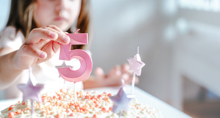 Big pink 5 number candle on homemade cake. Creative congratulations on five years for child girl....