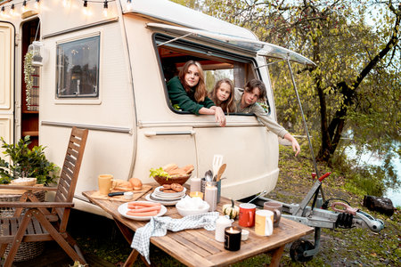 Children,family,brother sister traveling in camper,house on wheels. Trailer motor home.Looking in...