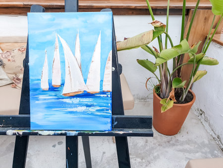 Turkey Marmaris 01.04.2023 Painting masterclass. Art party in restaurant. glass of wine. Aquarelle watercolor, acrylic paints. beginner class. Seascape nautical marine theme, sea boats, ships sails.の写真素材