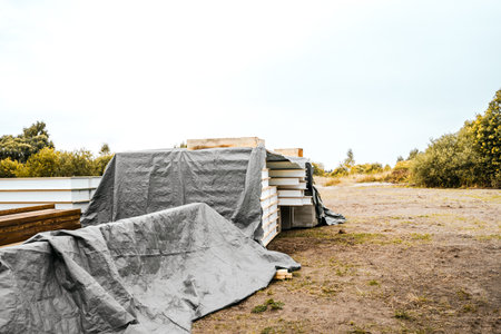 Building construction of wooden frame house made of SIP structural insulated panels. OSB oriented strand board, EPS expanded polystyrene. Energy-efficient eco-friendly green Canadian technology.の写真素材