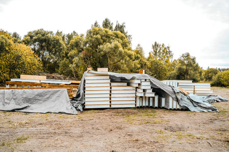 Building construction of wooden frame house made of SIP structural insulated panels. OSB oriented strand board, EPS expanded polystyrene. Energy-efficient eco-friendly green Canadian technology.の写真素材