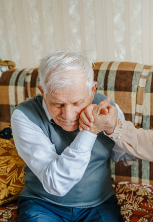 Elderly senior romantic love couple. Old retired man woman together. Aged husband wife in cozy home...