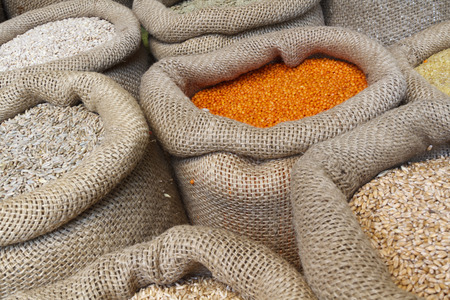 Beans, rice, lentils, oats, wheat, rye and barley in jute sack
