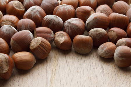 Hazelnut on wooden backgroundの写真素材