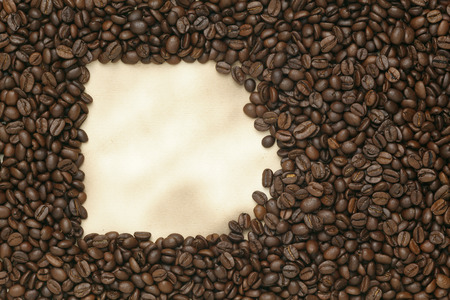 Caffe edition, coffee beans on old paperの写真素材