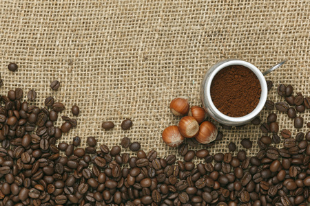 Caffe edition, coffee beans on Jute backgroundの写真素材