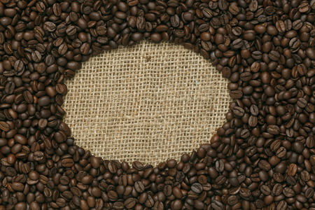 Caffe edition, coffee beans on Jute backgroundの写真素材