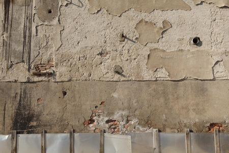 Old peeled  plastered wall