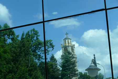 Reflection in windows of modern office buildingの写真素材