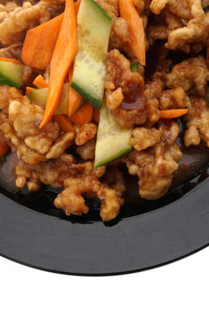 Chinese food. Stir fried Sweet and sour pork iwith wegetables. Asian Cuisine. Closeup.の写真素材