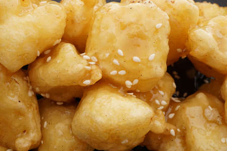 Chinese food. Caramelized apples. Closeup.の写真素材