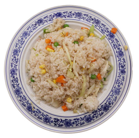 Chinese dish. Rice with vegetables  in white plate isolated on white. Closeup.の写真素材