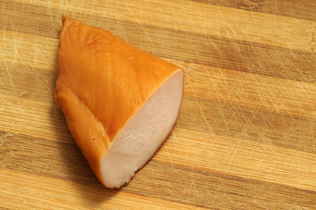 Fresh chicken ham on wooden background. close-upの写真素材