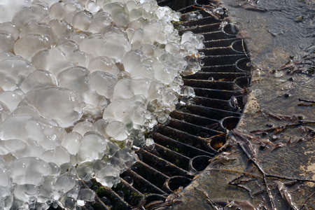 Frozen water fountain. Ice close up. Winter textured abstract background