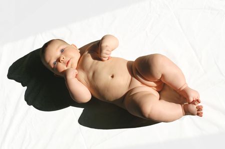 An image of a baby on a neutral background.の写真素材