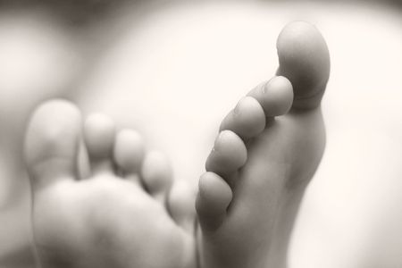 An image of little foots of sleeping の写真素材