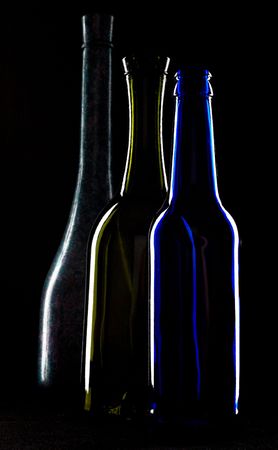 An image of silhouettes of bottles of wineの写真素材