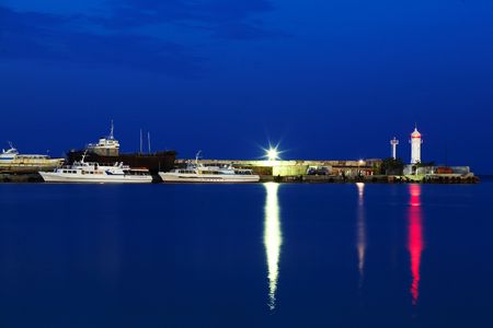 Ships near the pier. Shot at night.の写真素材