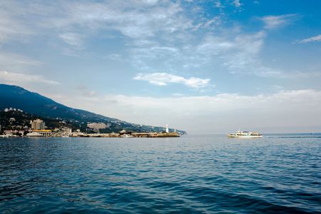 An image of blue sea and white shipの写真素材
