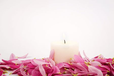An image of pink petals and candleの写真素材