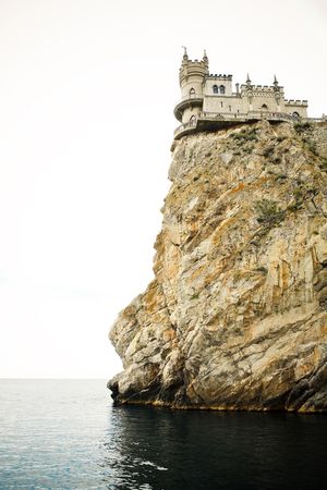 The castle in the Gothic style on cliff above the seaの写真素材