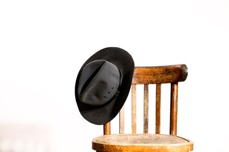 An image of wooden chair with hatの写真素材
