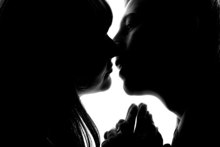 Couple theme. An image of kissing man and woman.の写真素材