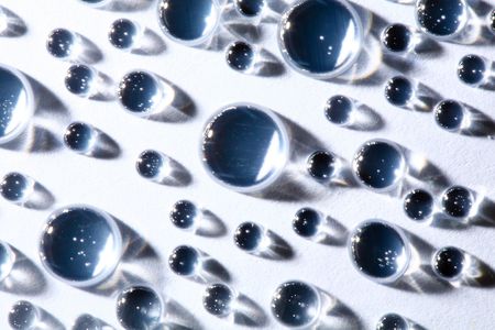 An image of water drops on neutral background