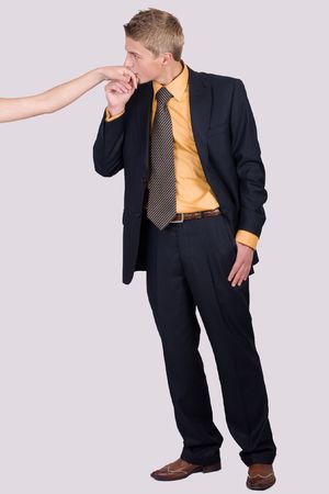 An image of man kissing girl's hand. Couple theme.の写真素材
