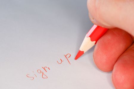 Closeup image of red pencil wrote "contact us"の写真素材