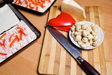 Stock photo: kitchen: an image of ingredients for pizza on the tableの写真素材