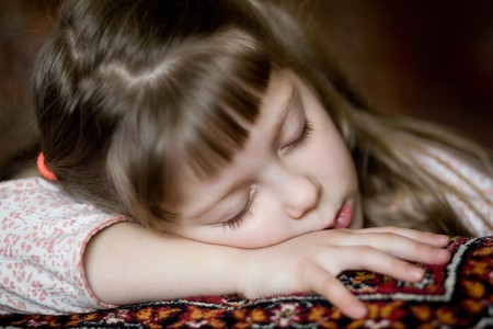 Stock photo: an image of a beautiful  girl on a sofa having sweet dreamsの写真素材