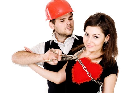 Stock photo: an image of a woman with heart and  a man with pliersの写真素材