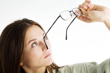 An image of a beautiful young girl with glassesの写真素材