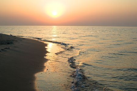 An image of pink sunset at the seaの写真素材