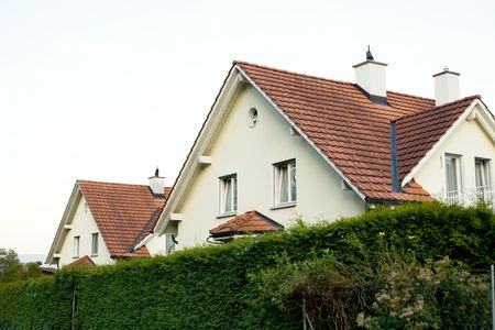 An image of a beautiful house with tile roofの写真素材